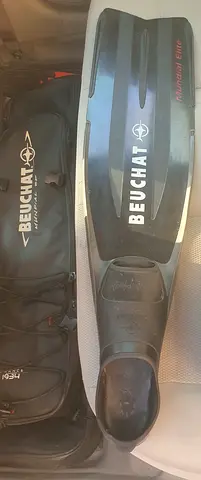 Beuchat Mundial Elite diving fins, mask, and snorkel with bag.