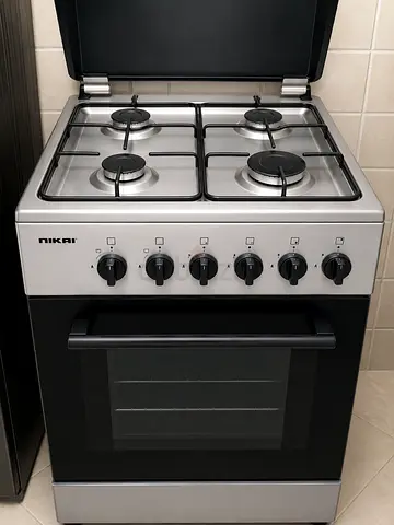 Nikai 4-Burner Gas Cooker with Oven - Good Working Condition