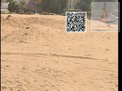 Two plots of land for sale in Al-Muwayhat at a bargain price, directly from the owner. Excellent loc