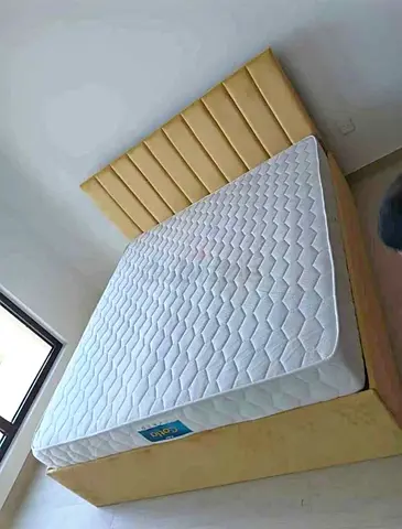 Queen bed frame with mattress - beige upholstered, good condition