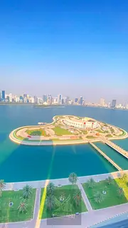 Three-bedroom apartment with a living room in Al Majaz 3, featuring free parking, a gym, and a swimm