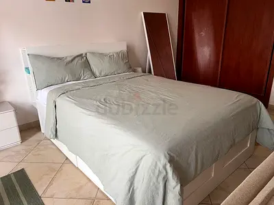 IKEA Brimnes bedframe with storage and headboard for sale