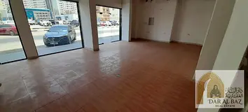 Shop for annual rent in Al Majaz 1. The shop is on an open street and suitable for commercial activi