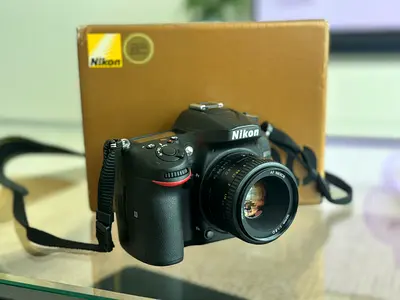 Nikon DSLR with AF 50mm 1.8D Nikkor Lens - Excelle Condition, includes strap, charger  original box