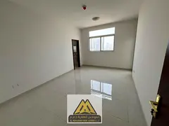 Two-bedroom apartment with a living room and balcony, second row from Ajman Corniche, close to all s