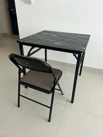 Foldable table with chair