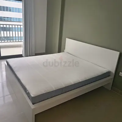 IKEA malam king‑size bed (180 × 200 cm) with an IKEA mattress
