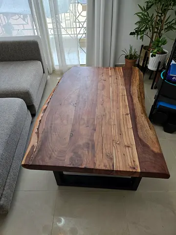 Solid Acacia Wood Coffee Table with Metal Legs from Home Center. Still in very good condition.