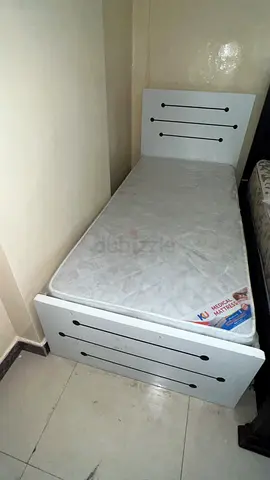 Single white wooden bed frame with mattress — good condition