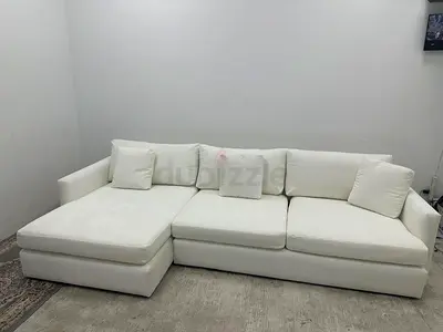 As perfect condition cratebarrel lshape sofa
