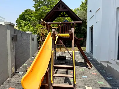 Wooden Outdoor Playset with Slide, Swings and Climbing Ladder - Used