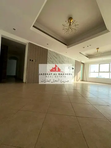 Two-bedroom apartment with a living room for sale in Al Khan, featuring a full frontal view of Al K