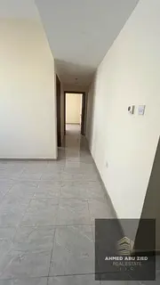Two‑bedroom apartment in Al Jurf 3 with two bathrooms, parking, flexible payment of 4 or 6 cheques