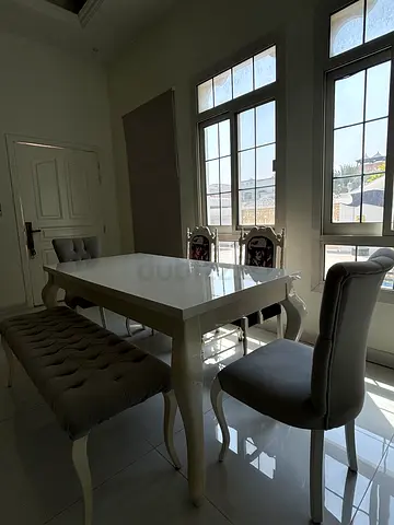 White family Dining table between (expandable ) to 12 chairs