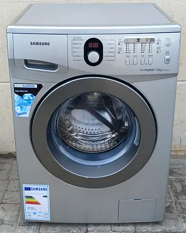 Samsung 7kg eco bubble washing machine, color silver, condition is working good.