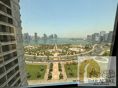 Two bedrooms and a spacious living room for annual rent in Al Majaz 2, with three bathrooms, built-i