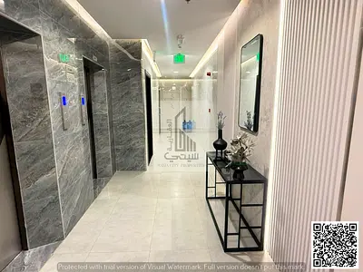 Two bedrooms and a living room in Al Jurf 3 with a large area