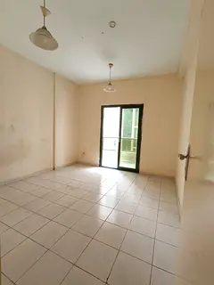 Annual apartment for rent in Al Nahda, Sharjah. One bedroom, living room, balcony, bathroom, central