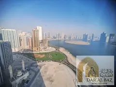Two spacious bedrooms and a living room for annual rent in Al Khan, Sharjah. Sea view, built-in ward