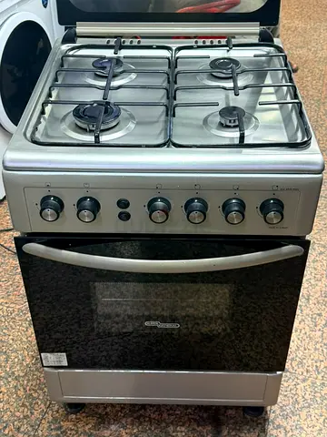 Used freestanding 4-burner gas stove with oven - stainless finish