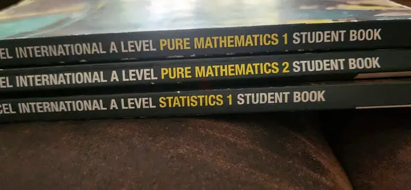 Pearson Pure Maths 12 , along with Statistics 1