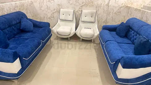 Blue velvet 2-seater sofas with 2 matching white accent chairs - good condition