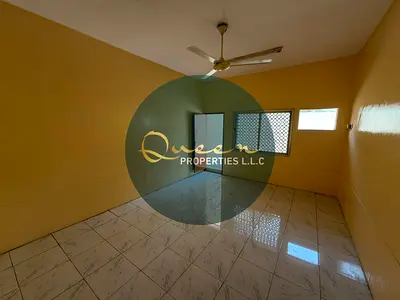 Spacious 2BR Apartment with Private Yard in Al Nuaimia 2 | Prime Location Next to Kuwait St