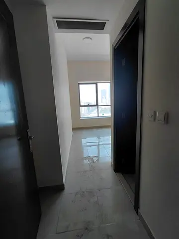 Annual rental in Al Khan, Sharjah. Spacious 2BR apartment near Nesto. Premium tower with gym and pa