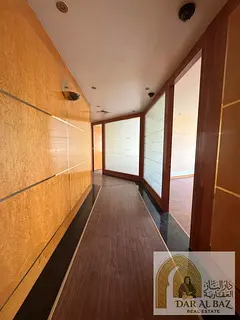 Office for annual Rent in Al Majaz 1, Sharjah | 6 Offices with Large Reception, Free AC, 6 Months Fr