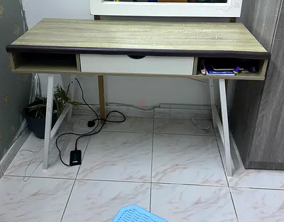 Compact study desk with drawer and open shelves - good condition