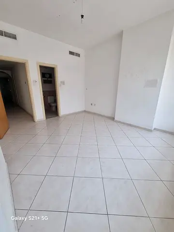 For rent in Al Majaz 3, Sharjah: 3BR apartment, master room, store, 3 bathrooms, 2 balconies, open view, 1 month free. AED 60,000/year, 4 payments.