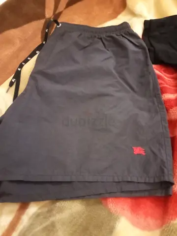 Gray casual swim shorts with elastic waist,  burberry size approx 52