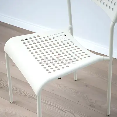 White Modern Perforated Plastic Dining/Side Chair - Lightweight