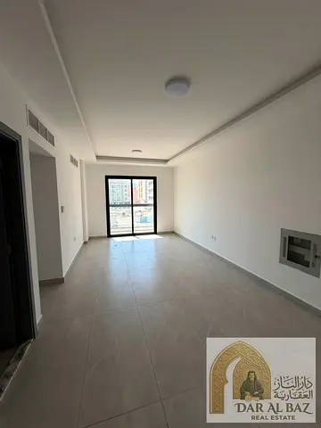 Apartment for annual rent in Al Jurf, Ajman. Two bedrooms, first occupancy. Two master bedrooms with a laundry room. Close to the Chinese market.