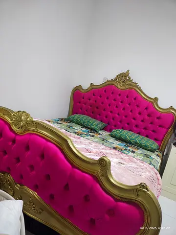 Ornate Gold Frame Bed Headboard with Pink Tufted Upholstery
