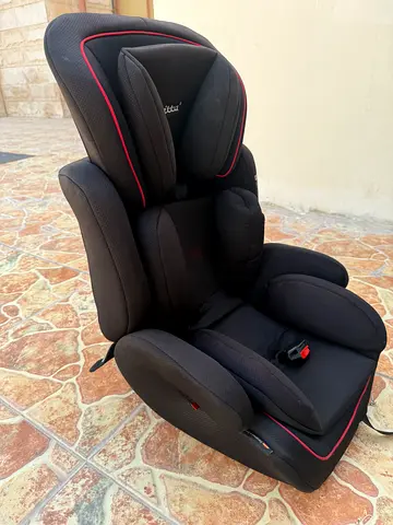 Used convertible toddler car seat - black with red trim