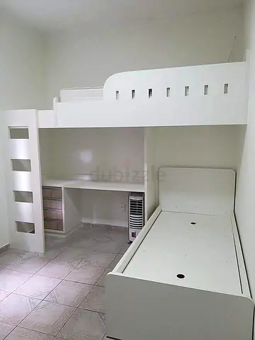 White loft bunk bed with built-in desk and single bed — good condition