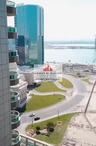 A unique apartment for sale in Al Khan, consisting of two rooms and a living room divided into three rooms, with a maid's room and a private parking s