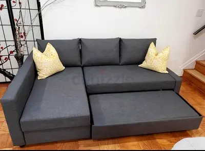 Grey L-Shaped Sofa Bed with Pull Out Section