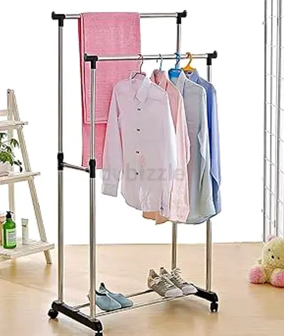 BRAND NEW DOUBLE POLE TELESCOPIC CLOTHES RACK