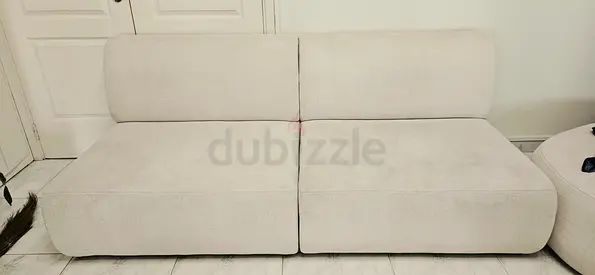Beige 2-seater modular sofa - clean, modern design. Sellimg due to lack of space