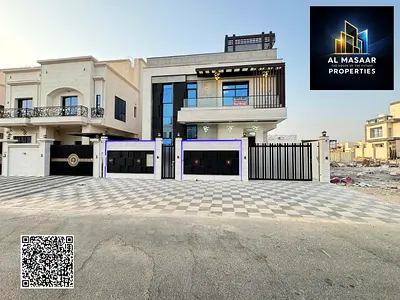 Ready-to-move-in villa with electricity and water connections, featuring 6 master bedrooms, a majlis (formal sitting room), and 2 living rooms. A uniq