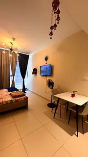 A clean and well-maintained studio apartment is available, suitable for a small family or working co