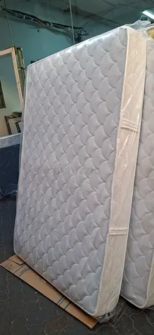 Firm single mattress - good condition, washable cover
