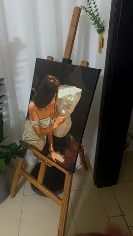 Framed Canvas Painting of Woman on Wooden Easel