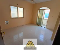 Annual rent: 1-bedroom apartment in Al Mowaihat 3, balcony, closed kitchen, central AC, near service