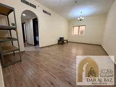 Luxury two-bedroom apartment with a spacious living room available for annual rent in the Muwaileh a
