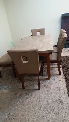 Wooden dining table with 4 upholstered chairs - good condition
