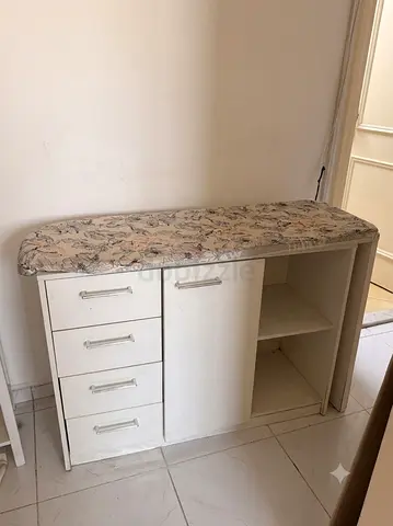 Iron stand with storage cupboards
