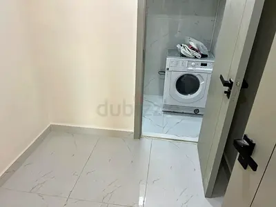 Front-load washing machine - Brand new not used , suitable for built in cabinets.